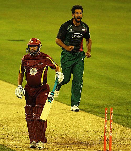 Nadeem Malik, who grabbed four wickets, celebrates the fall of Andrew Hall