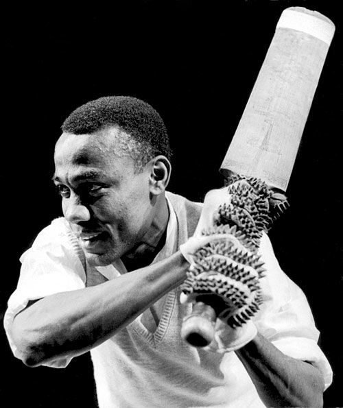 Conrad Hunte poses with a bat