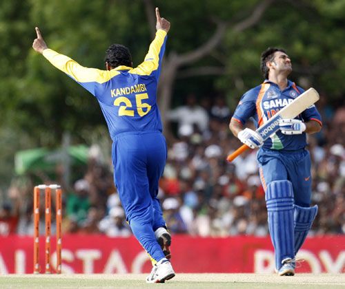 Thilina Kandamby exults after getting the big wicket of MS Dhoni