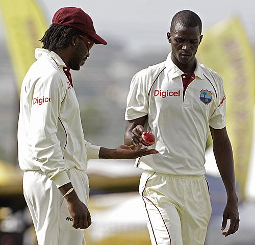 Chis Gayle with rookie fast bowler Brandon Bess
