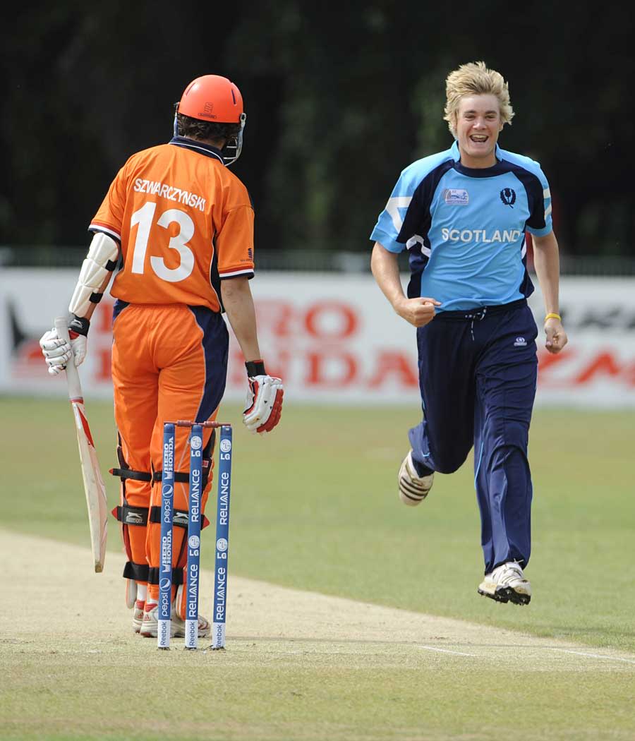Matthew Parker celebrates as he removes Eric Szwarczynski