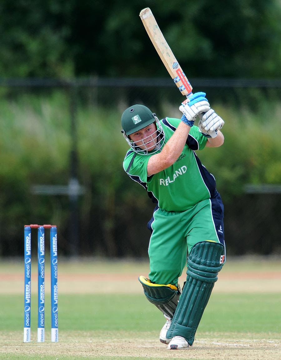 Andrew Poynter drives off the front foot