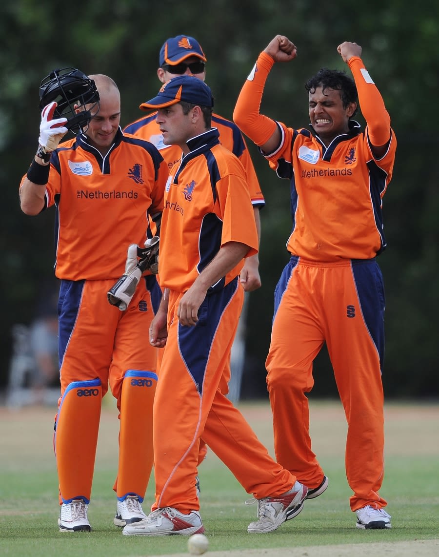 Adeel Raja celebrates one of his two wickets against Canada