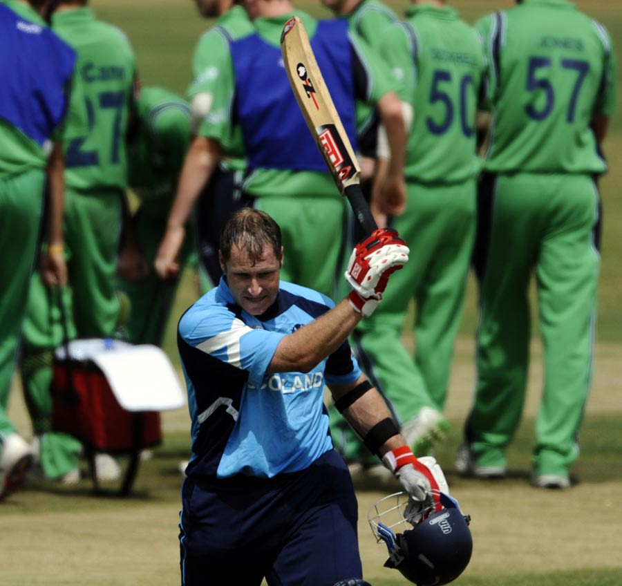 Scotland's Neil McCallum is dejected after missing a half-century
