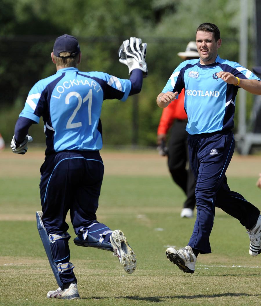 Scotland's George Goudie celebrates a wicket