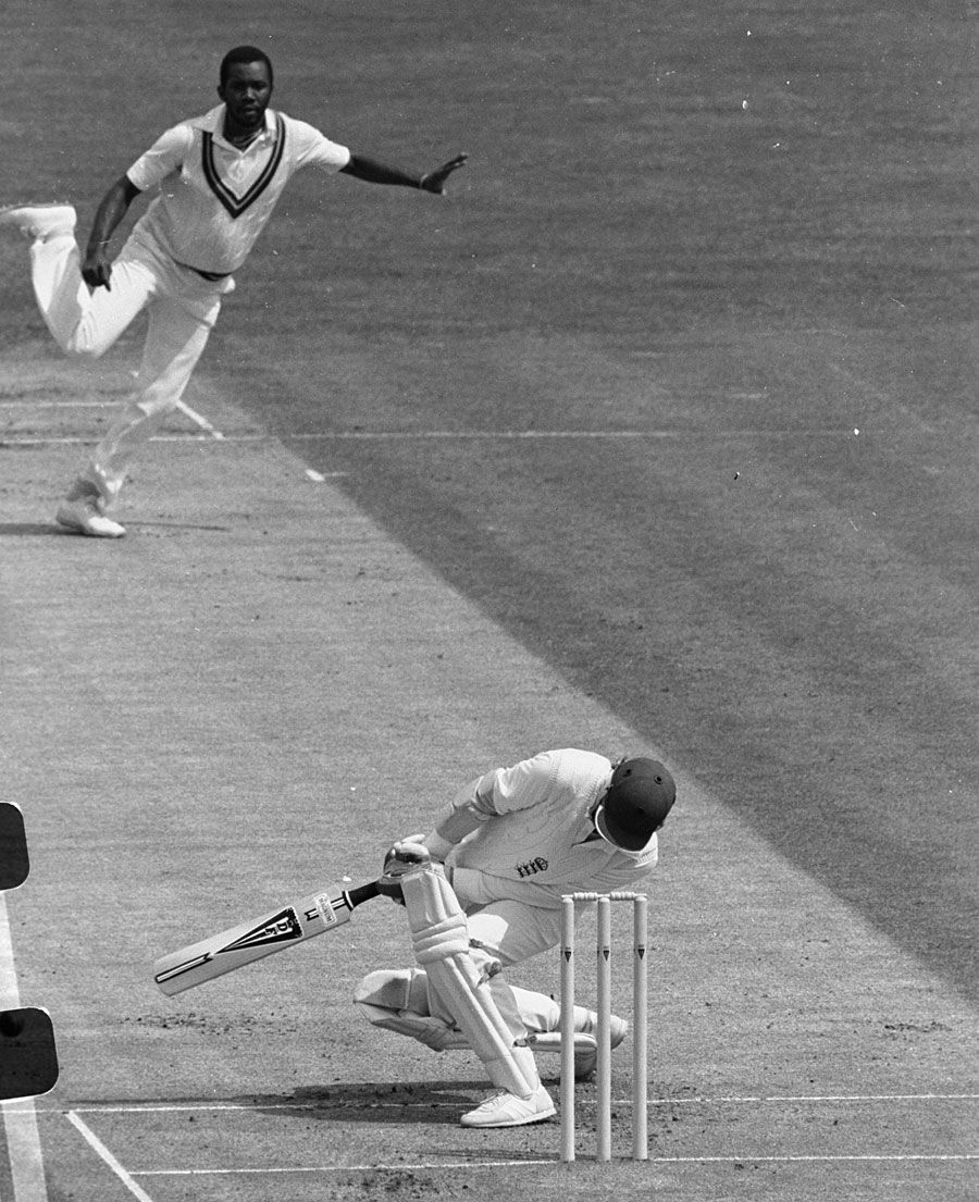 Andy Lloyd tries to unsuccessfully avoid a Malcolm Marshall bouncer