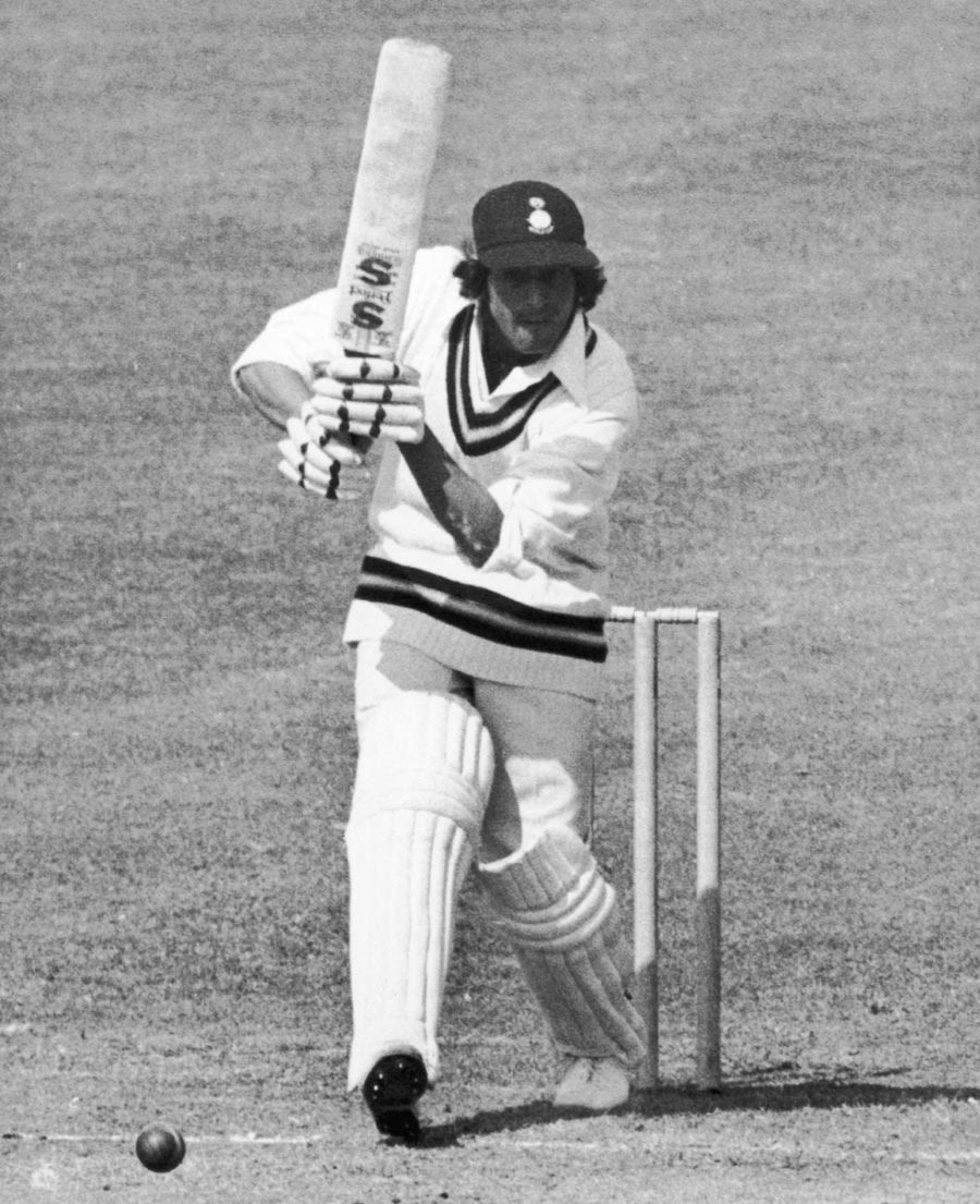 Eknath Solkar punches the ball down the ground