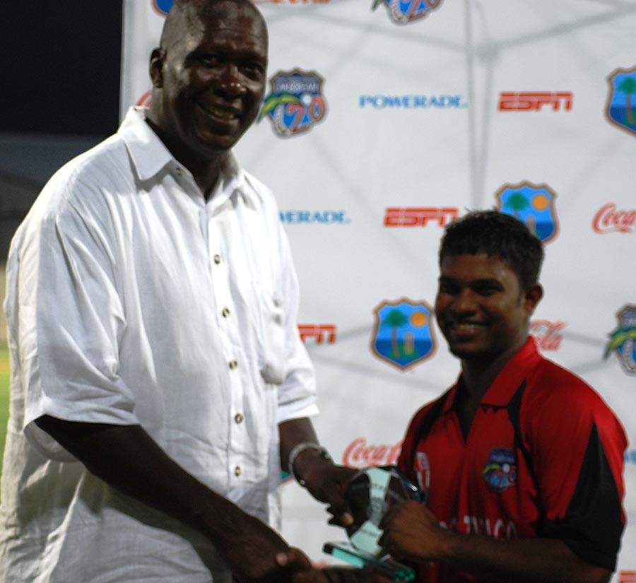 Adrian Barath gets his Man-of-the-Match award from Joel Garner