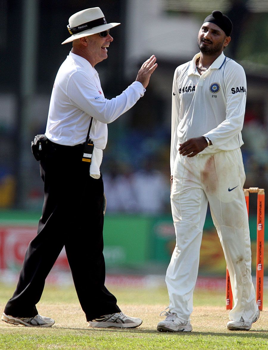 Daryl Harper shares a light moment with Harbhajan Singh