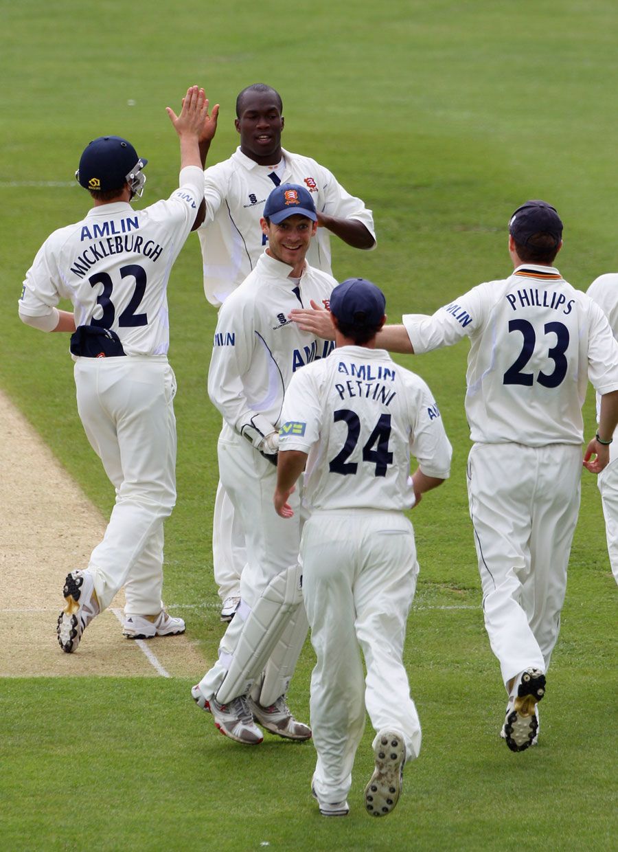 Maurice Chambers is congratulated by his team-mates after removing Rob Key