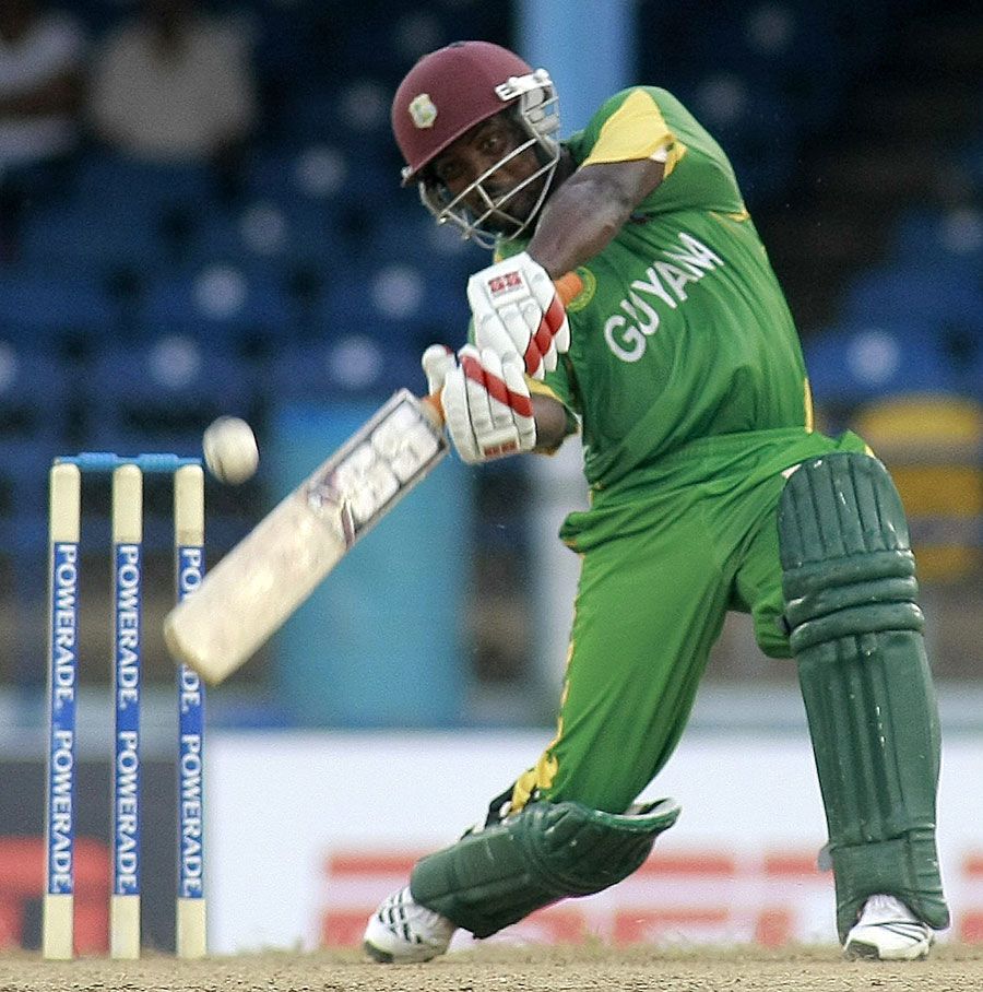 Travis Dowlin launches one over the off side during his fifty