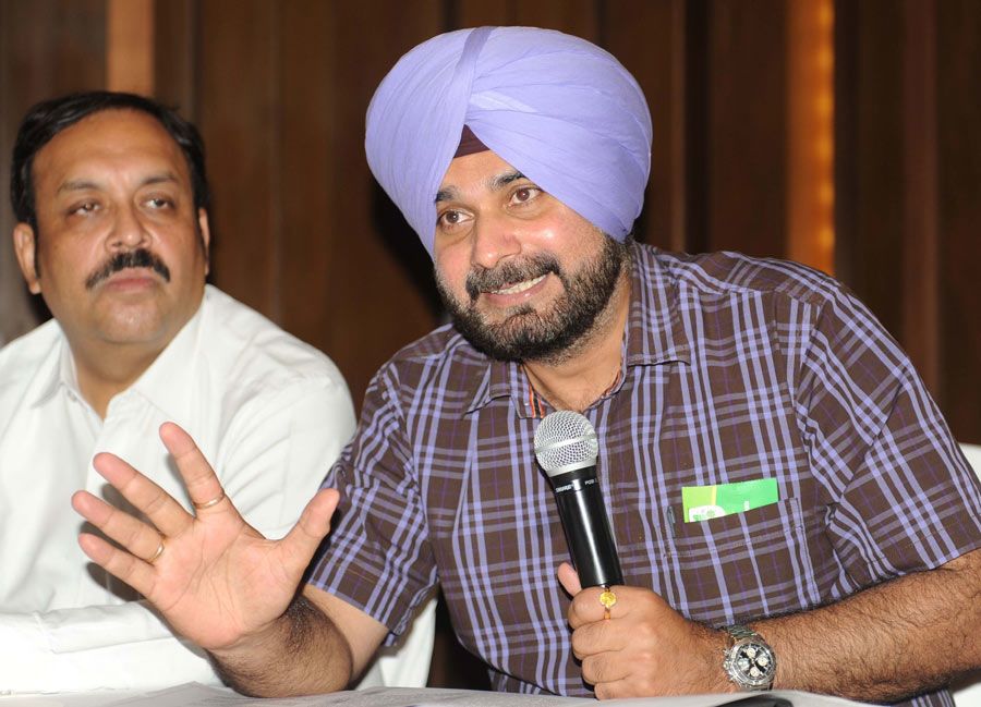 Former Indian cricketer and current member of parliament Navjot Sidhu addresses the press