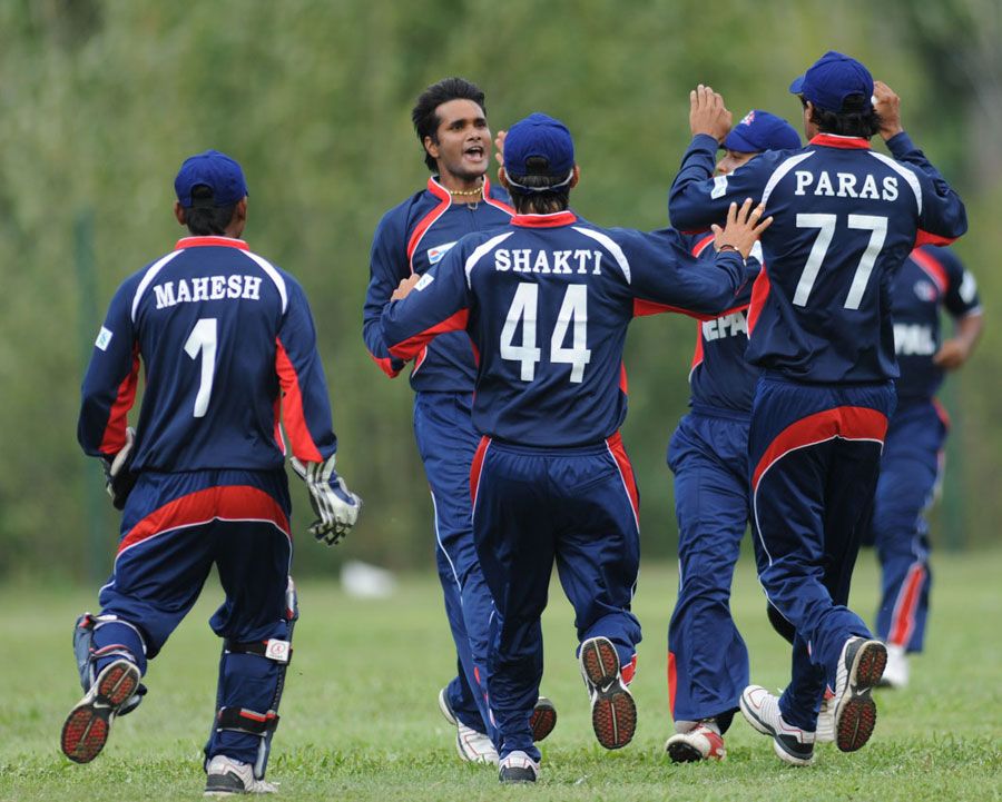 Nepal bowler Binod Das celebrates a dismissal with his team-mates