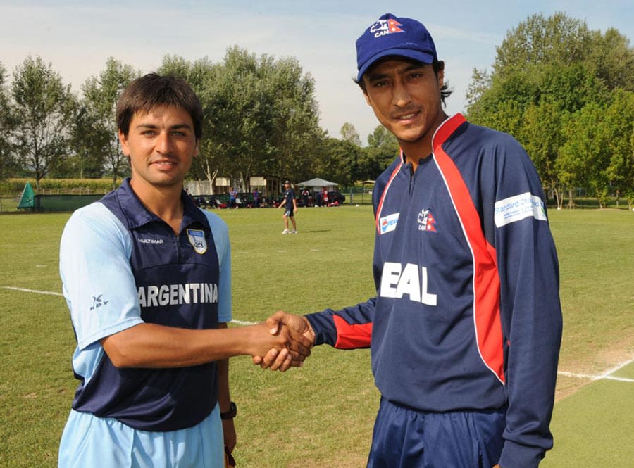 Captains Esteban MacDermott and Paras Khadka at the toss