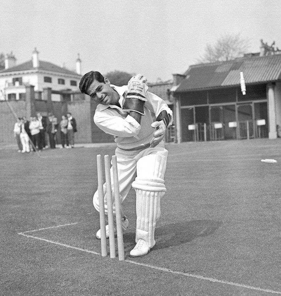 Indian wicketkeeper Naren Tamhane poses behind the stumps