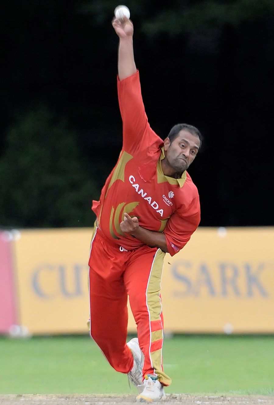Khurram Chohan bowls during his fruitful spell