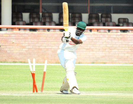 Mountaineers' Bernard Mlambo is cleaned up by Njabulo Ncube