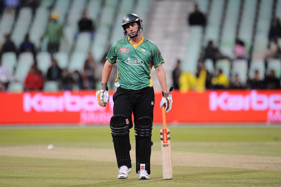 Mathew Sinclair walks back after being dismissed
