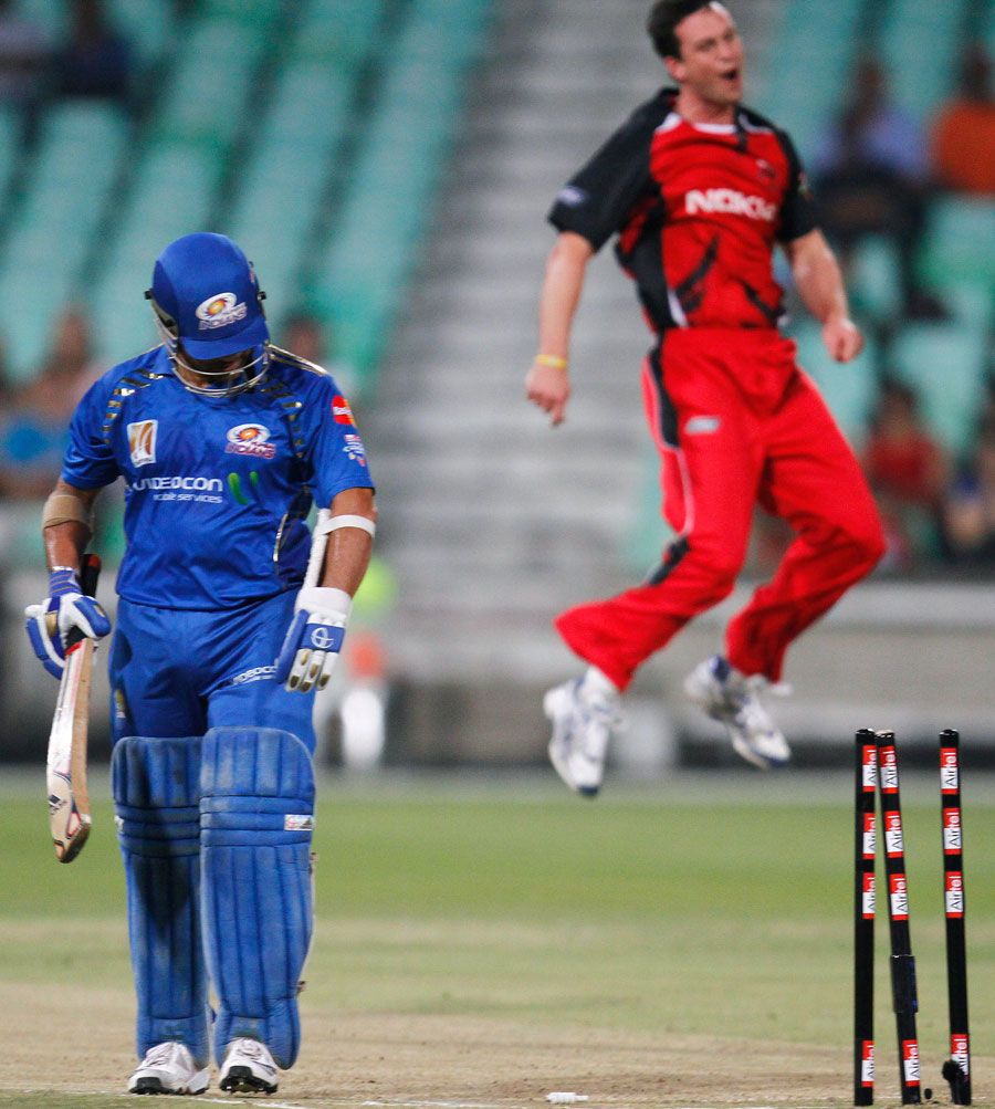 Aaron O'Brien exults after bowling Sachin Tendulkar