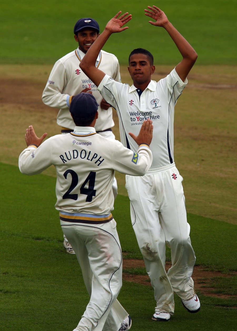 18-year-old Moin Ashraf is congratulated on reaching his maiden first-class five-wicket haul
