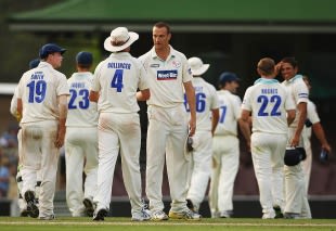 New South Wales cruise to ten-wicket win