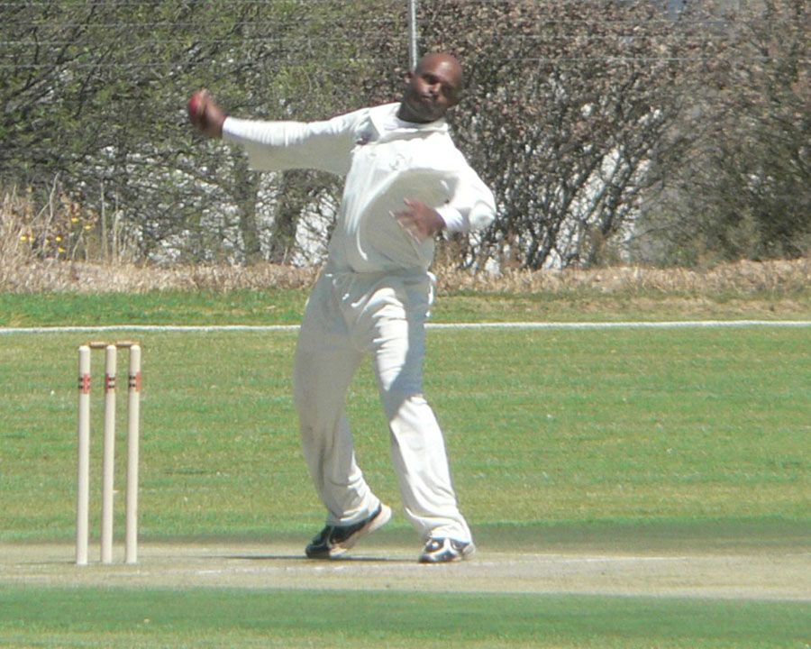 Uganda captain Akbar Baig bowls