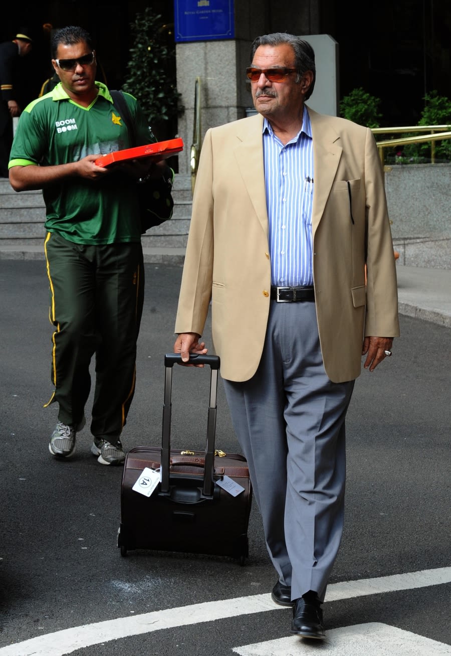 Pakistan team manager Yawar Saeed and coach Waqar Younis leave the team hotel in London