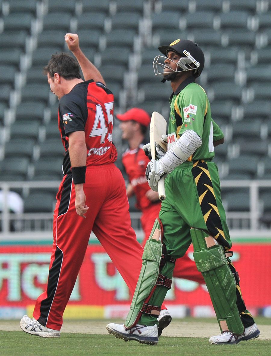 Richard Ramdeen walks back after being dismissed by Daniel Christian