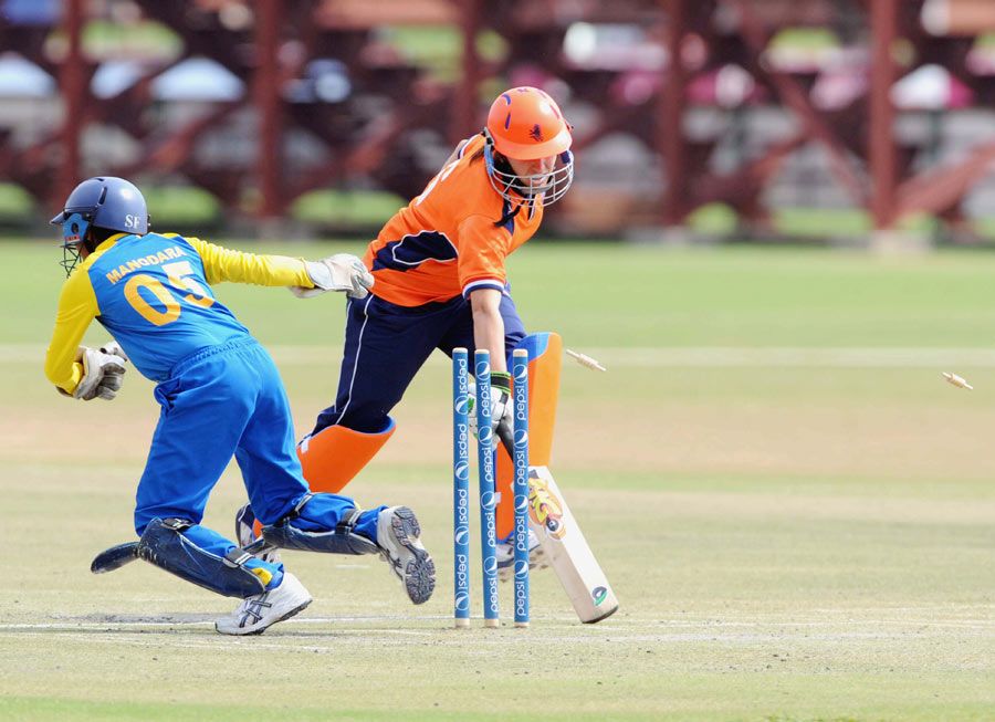 Netherlands opener Esther Lanser is run out by Dilani Manodara