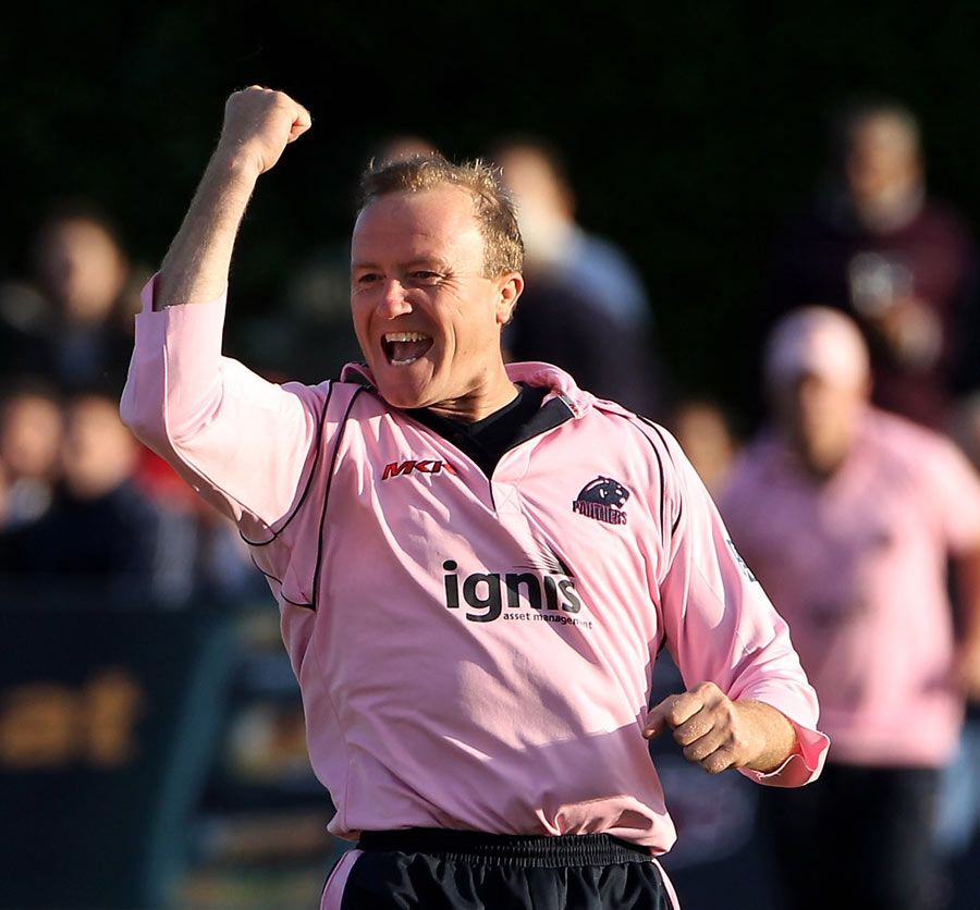 Shaun Udal celebrates a wicket