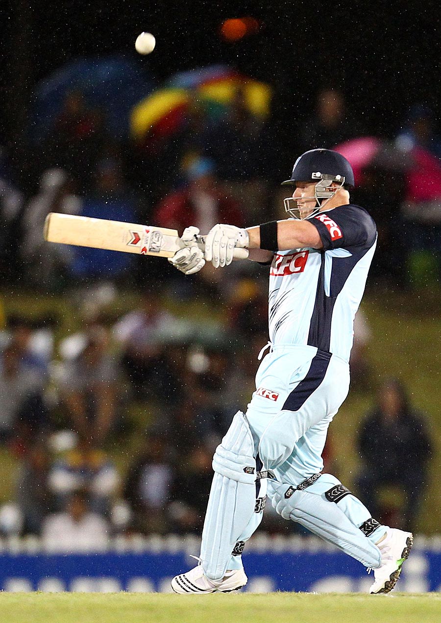 Daniel Smith swings in the rain