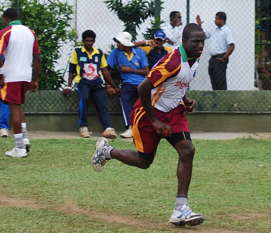Nelon Pascal runs in to bowl during a net session