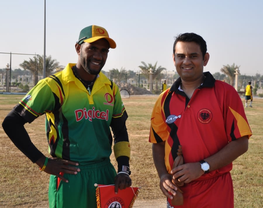 Andrew Mansale, Vanuatu's captain, and Germany captain Asif Khan after the toss