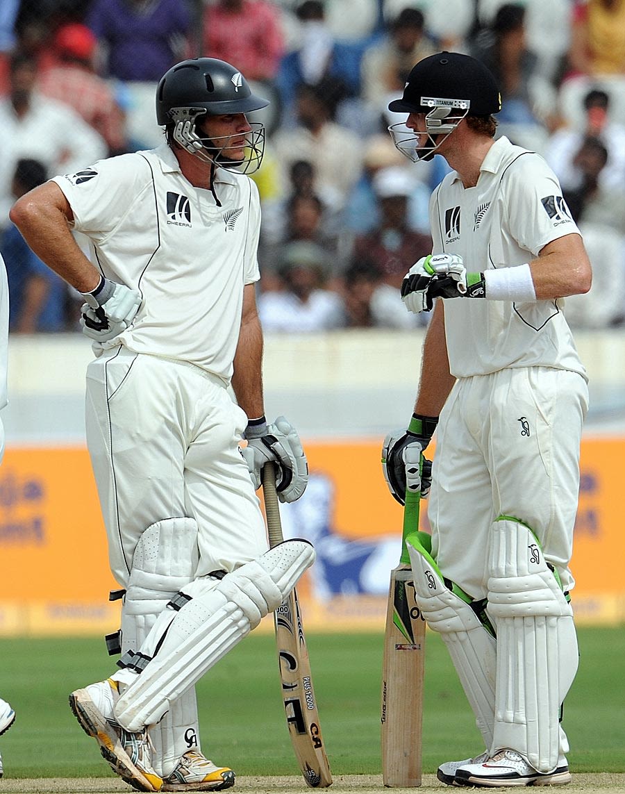 Martin Guptill and Tim McIntosh have a chat during their partnership