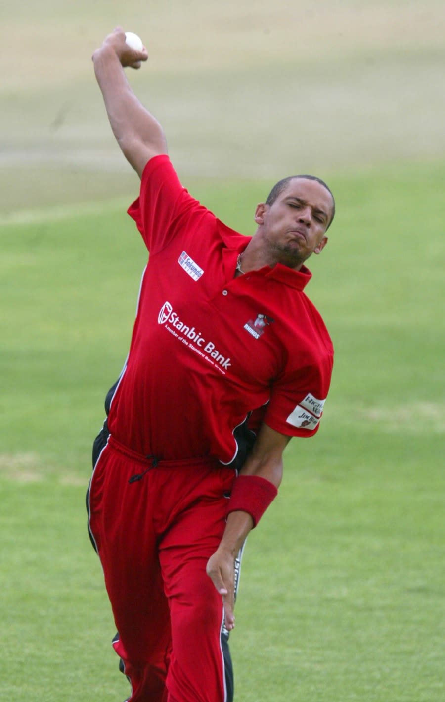 Ed Rainsford bowls against Mashonaland Eagles