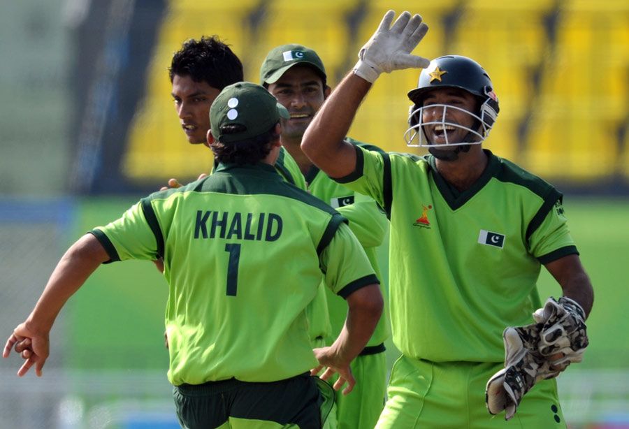 Wicketkeeper Sheharyar Ghani and Khalid Latif are delighted after a Sri Lanka run-out