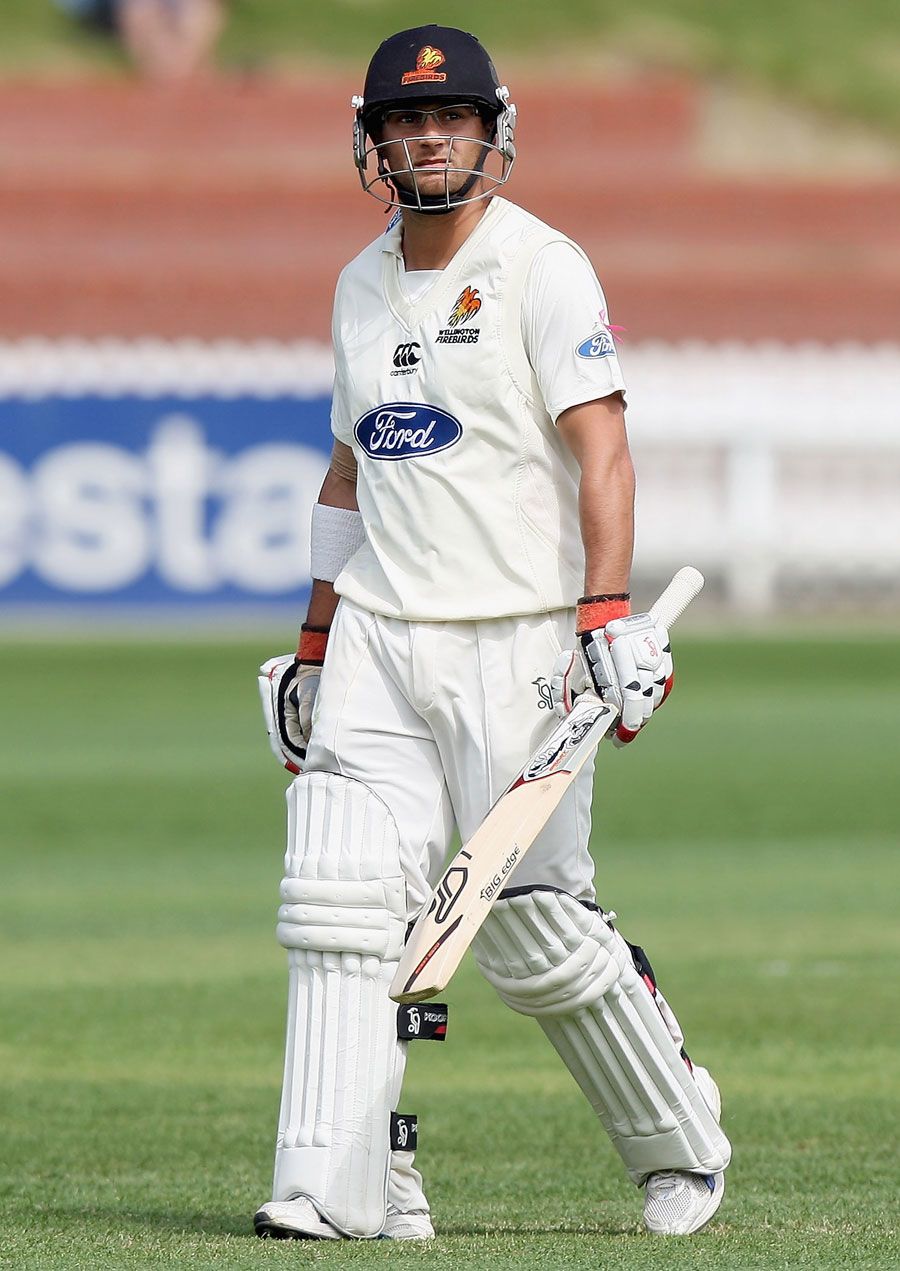 Wellington's Cameron Merchant walks back after his dismissal