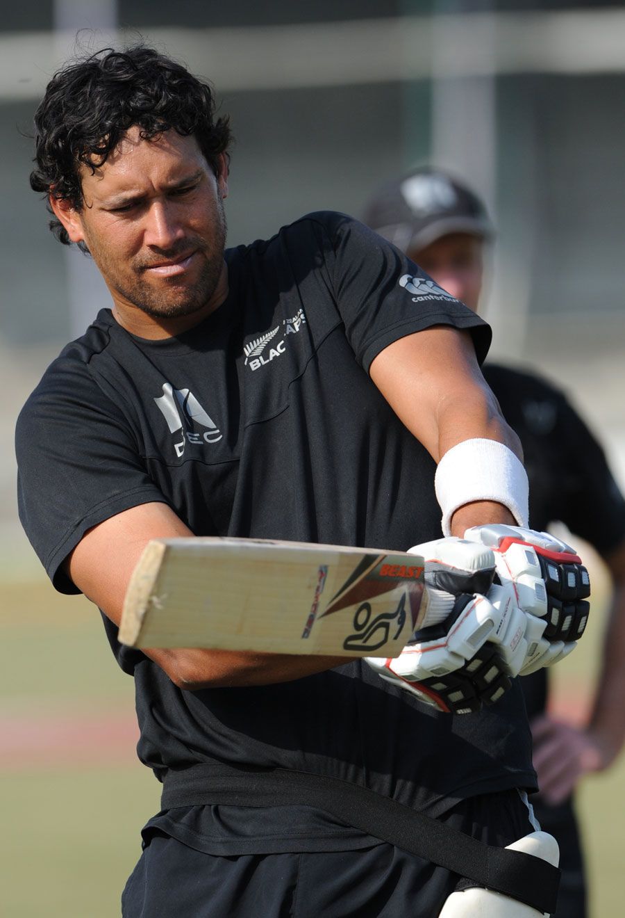 Daryl Tuffey has a bat in New Zealand's training session