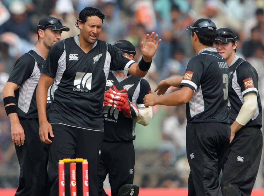 Daryl Tuffey takes his second wicket of the innings, dismissing Yuvraj Singh