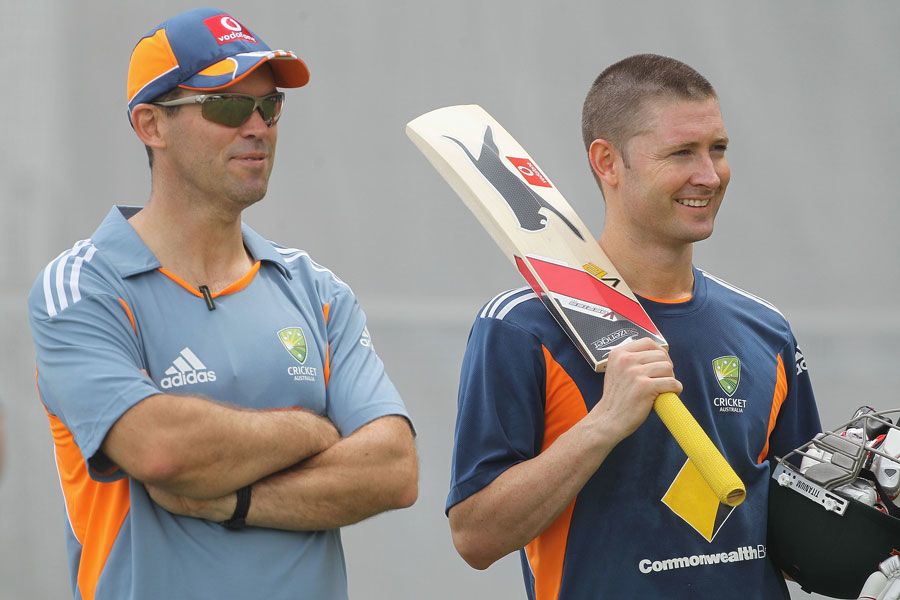 Assistant coach Dene Hills with Michael Clarke at Australia's training session