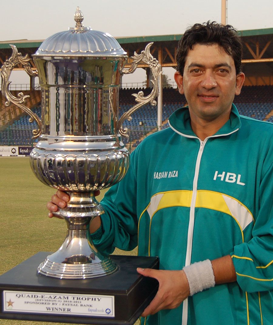 Hasan Raza, the HBL captain, poses with the winner's trophy