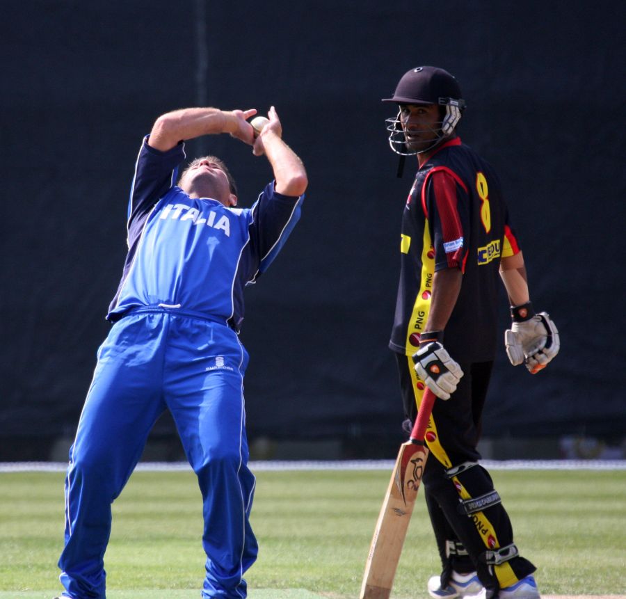 Peter Petricola completes a caught-and-bowled to end Papua New Guinea's innings
