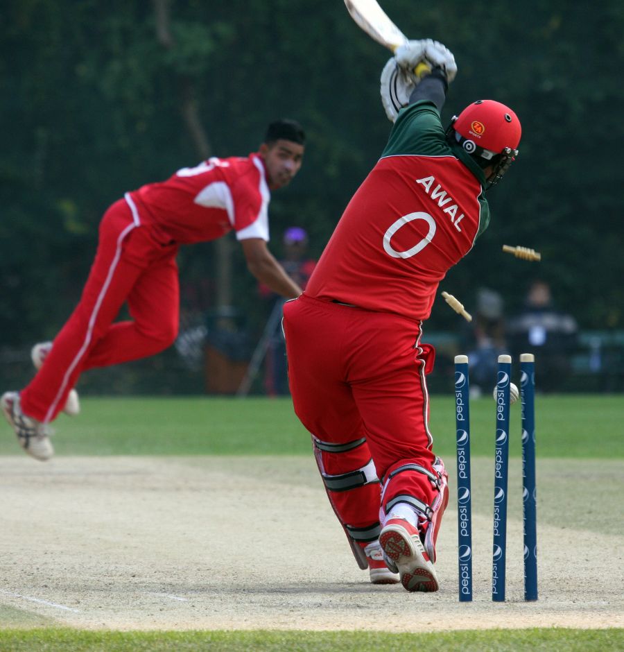 Awal Khan is clean bowled by Irfan Ahmed