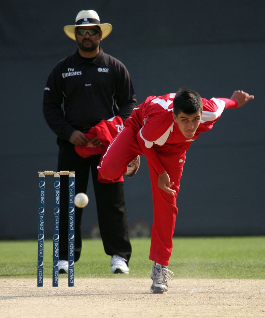 Aizaz Khan bowls for Hong Kong