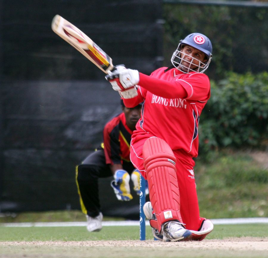 Hong Kong captain Najeeb Amar slog-sweeps for six