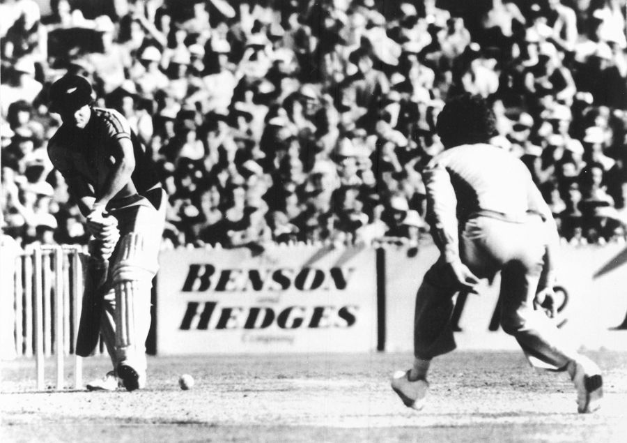 Trevor Chappell rolls the final ball of the match on the floor