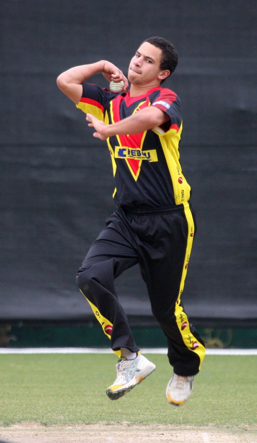 Chris Kent bowls against Hong Kong