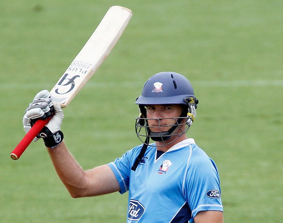 Tim McIntosh signals his century