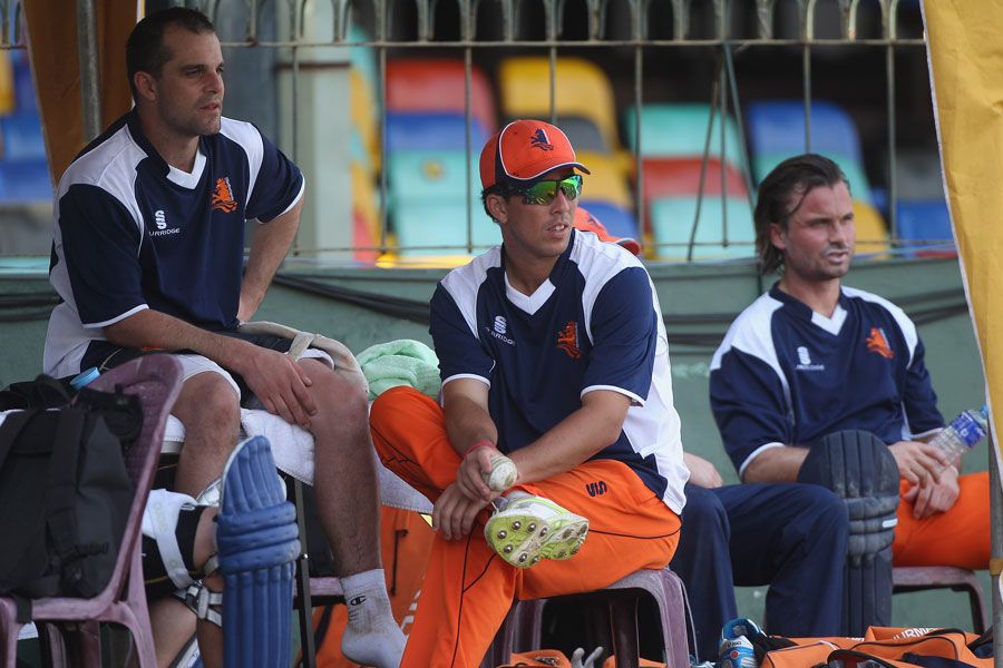 Peter Borren, Tom Cooper and Bas Zuiderent look on during Netherlands' training session at the SSC