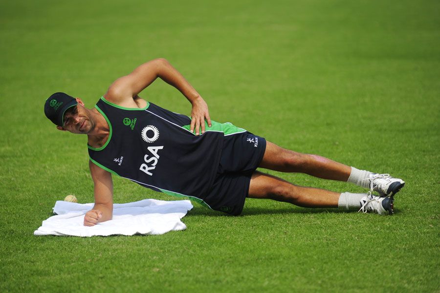 Andre Botha of Ireland warms up at practice